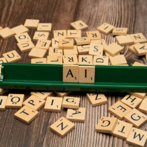 Wooden letter tiles spelling AI, representing technology and innovation.